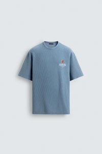 T-SHIRT DE MALHA LAVADA ESTAMPADO GOMAS
