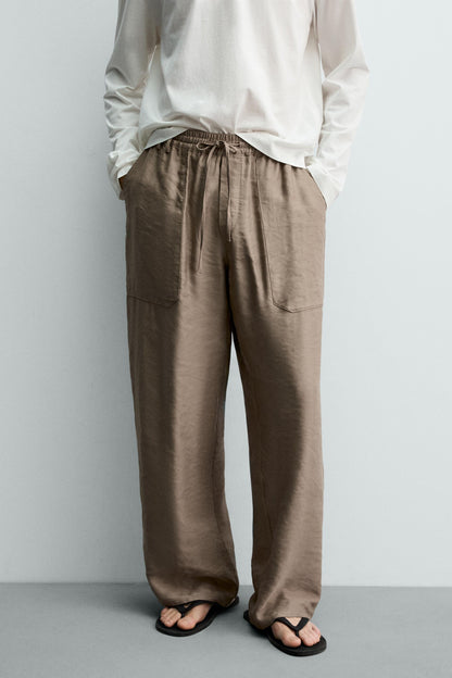 CALÇAS FLUIDAS RELAXED FIT