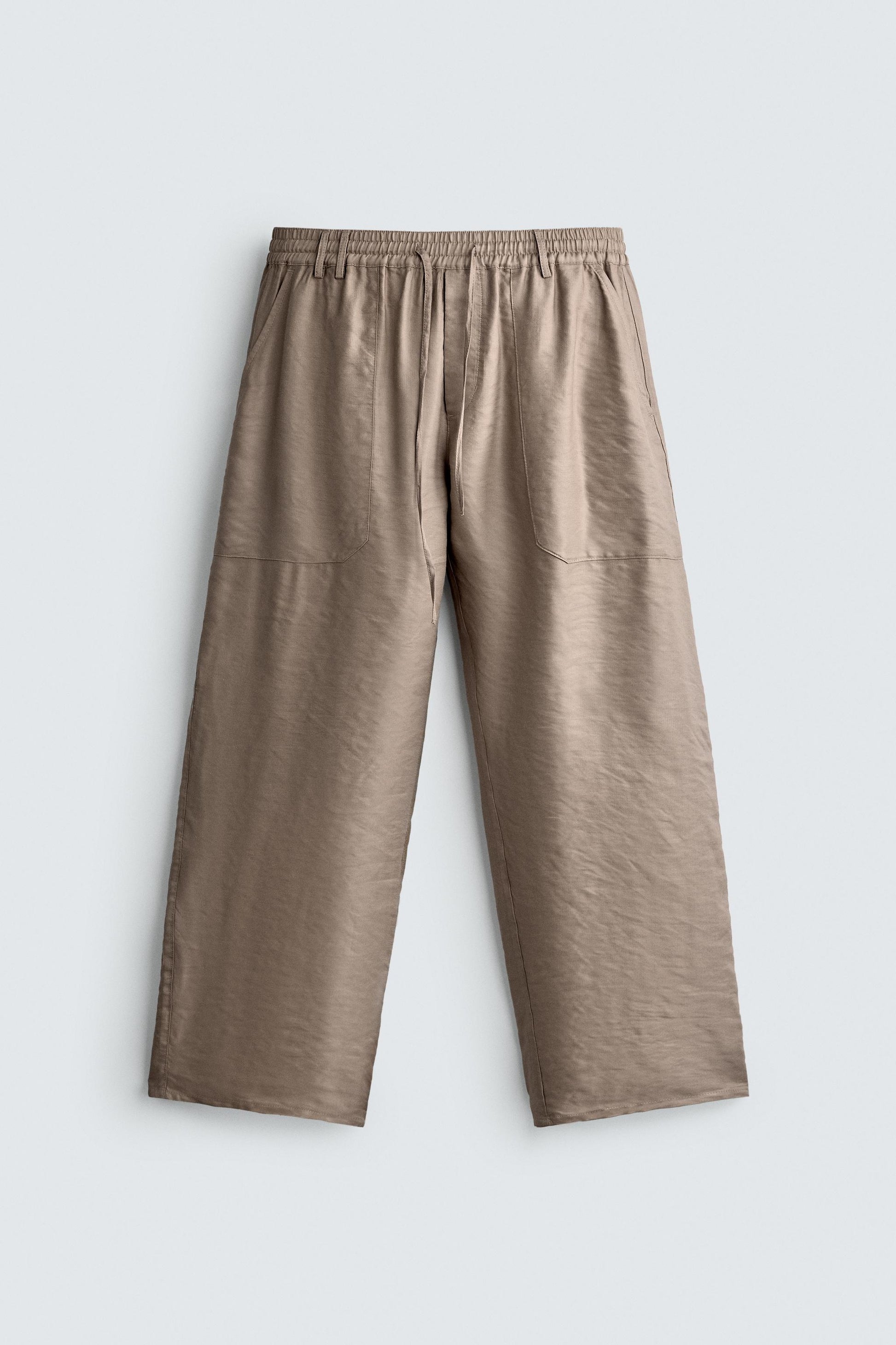 CALÇAS FLUIDAS RELAXED FIT