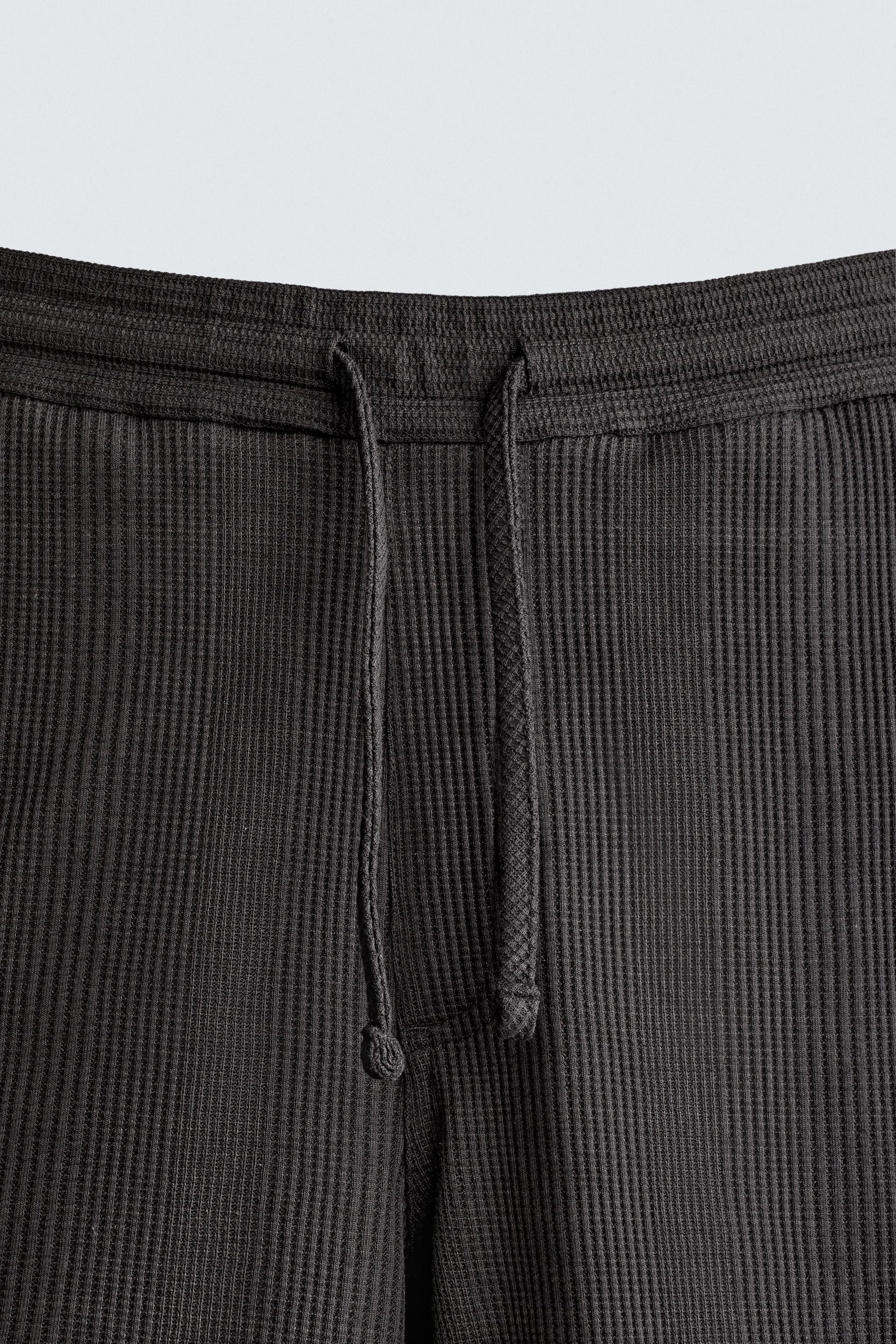 CALÇÕES BERMUDA RELAXED FIT COM ESTRUTURA