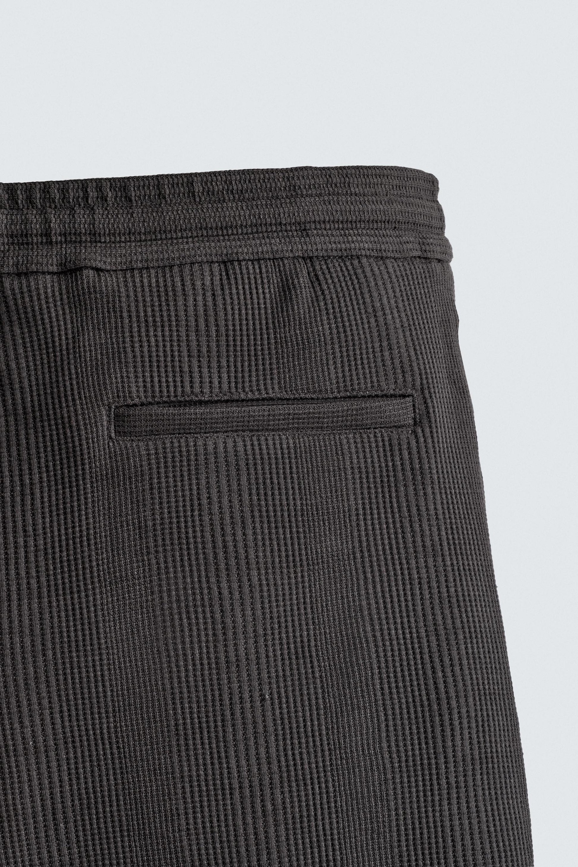 CALÇÕES BERMUDA RELAXED FIT COM ESTRUTURA
