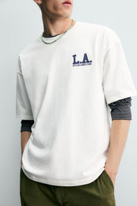 T-SHIRT RELAX FIT COM ESTAMPADOS EFEITO LAVADO