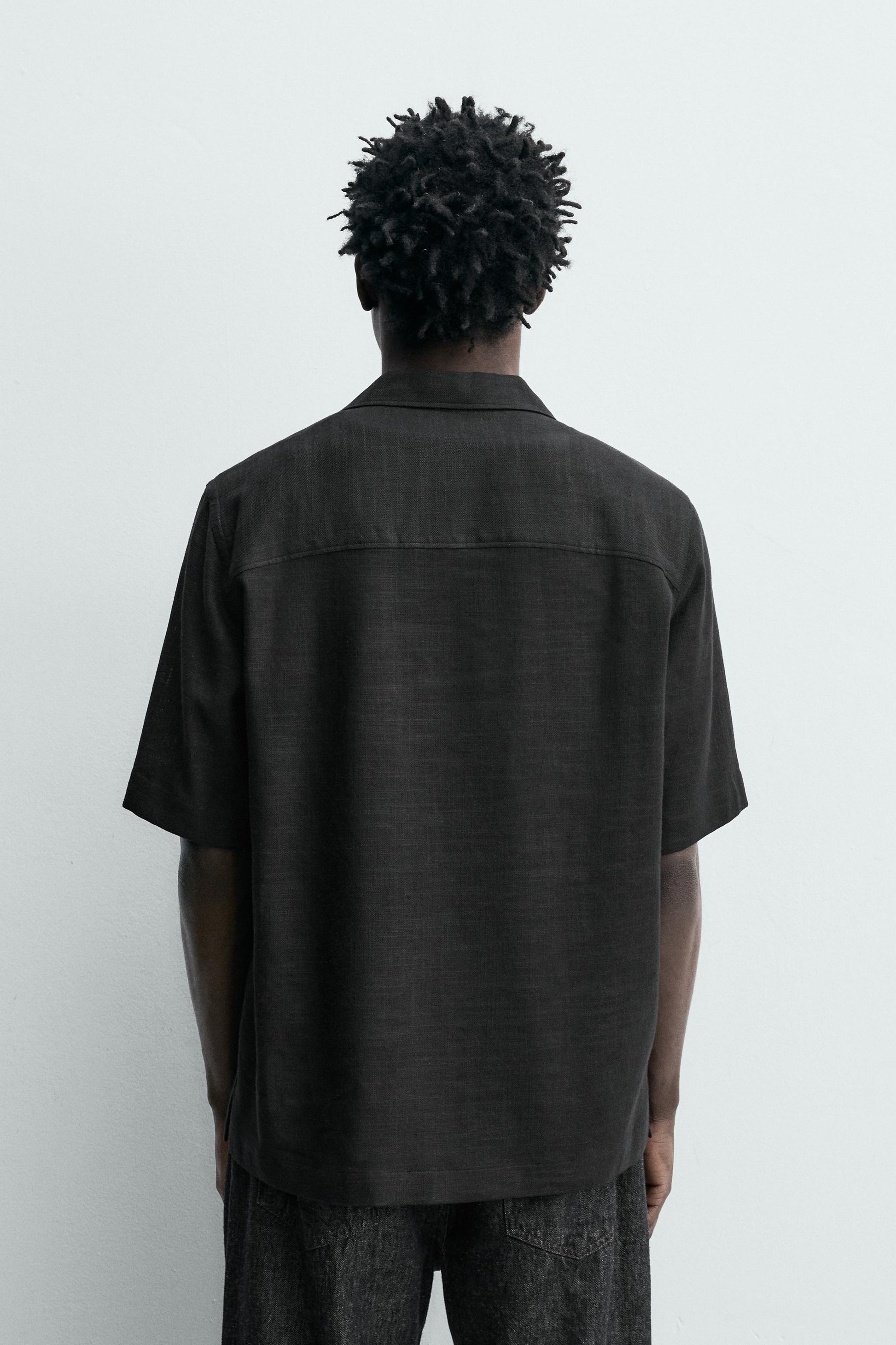 CAMISA FLUIDA COM ESTRUTURA