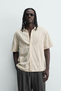 CAMISA FLUIDA ÀS RISCAS