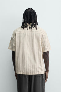 CAMISA FLUIDA ÀS RISCAS