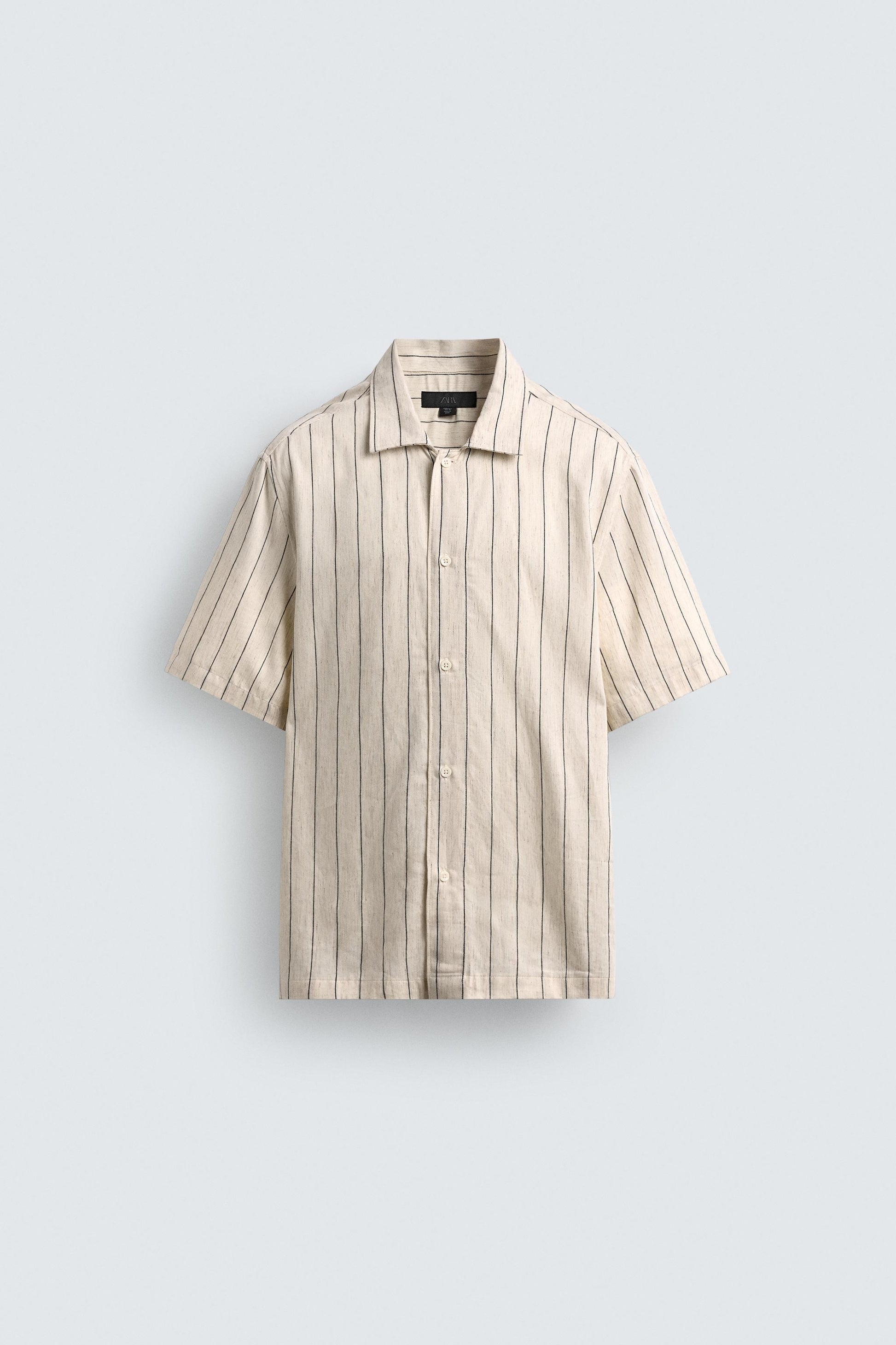 CAMISA FLUIDA ÀS RISCAS