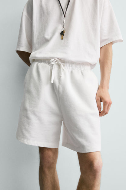 CALÇÕES BERMUDA JOGGER BÁSICOS LAVADOS