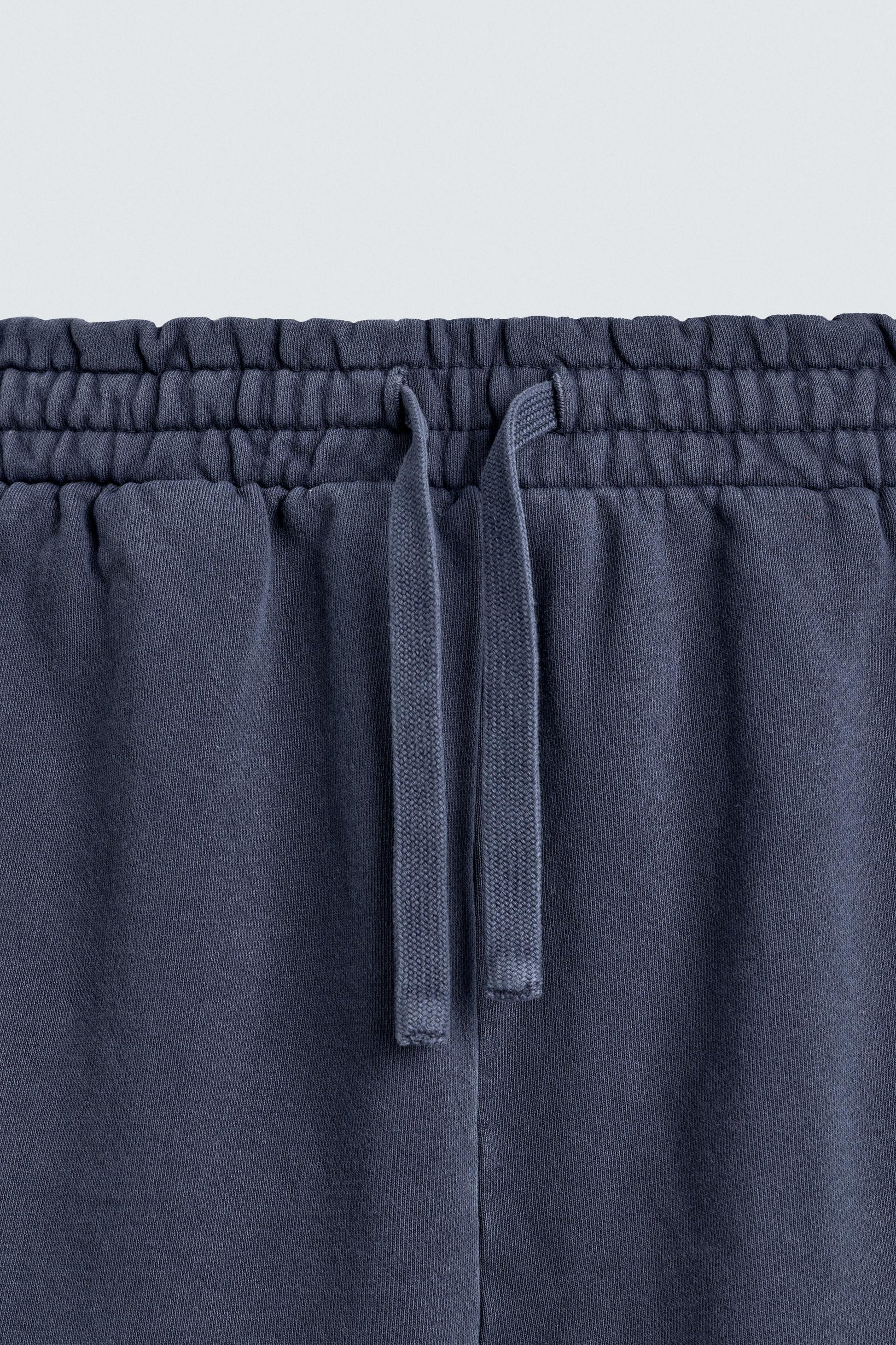 CALÇÕES BERMUDA JOGGER BÁSICOS LAVADOS