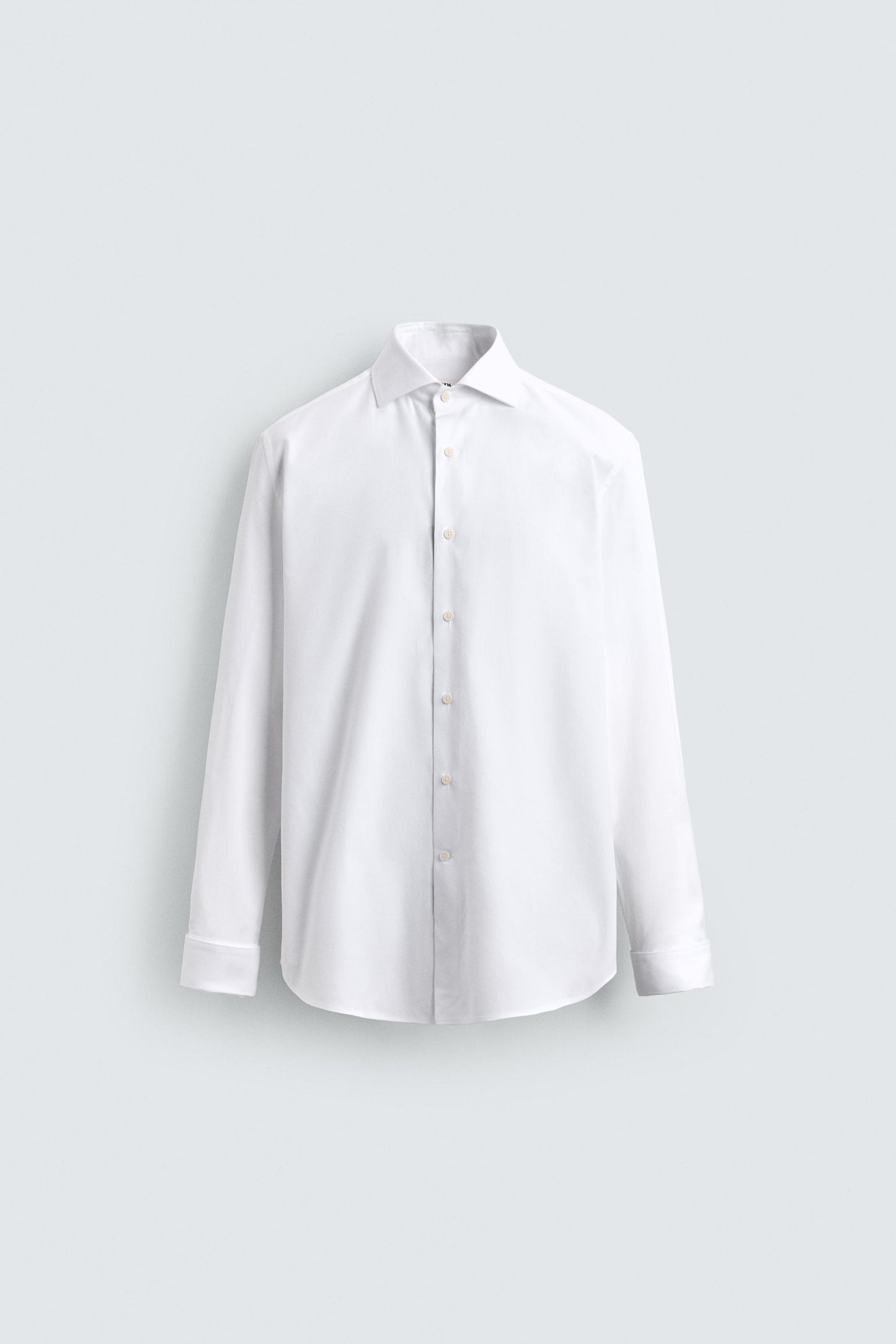 CAMISA SLIM FIT PUNHO COM BOTÃO