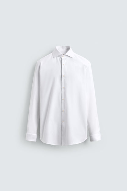 CAMISA SLIM FIT PUNHO COM BOTÃO