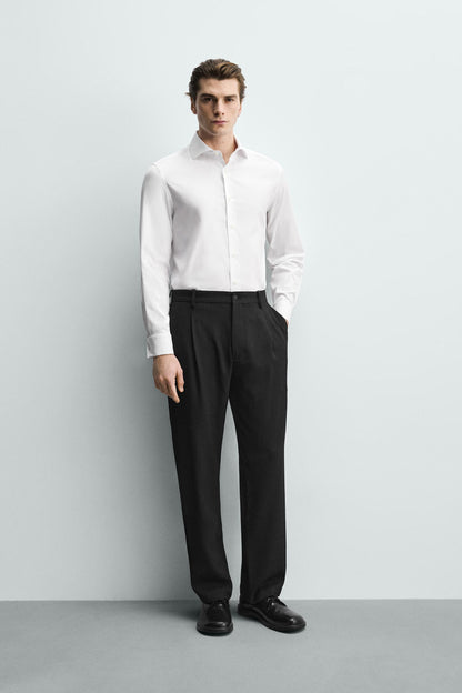 CAMISA SLIM FIT PUNHO COM BOTÃO