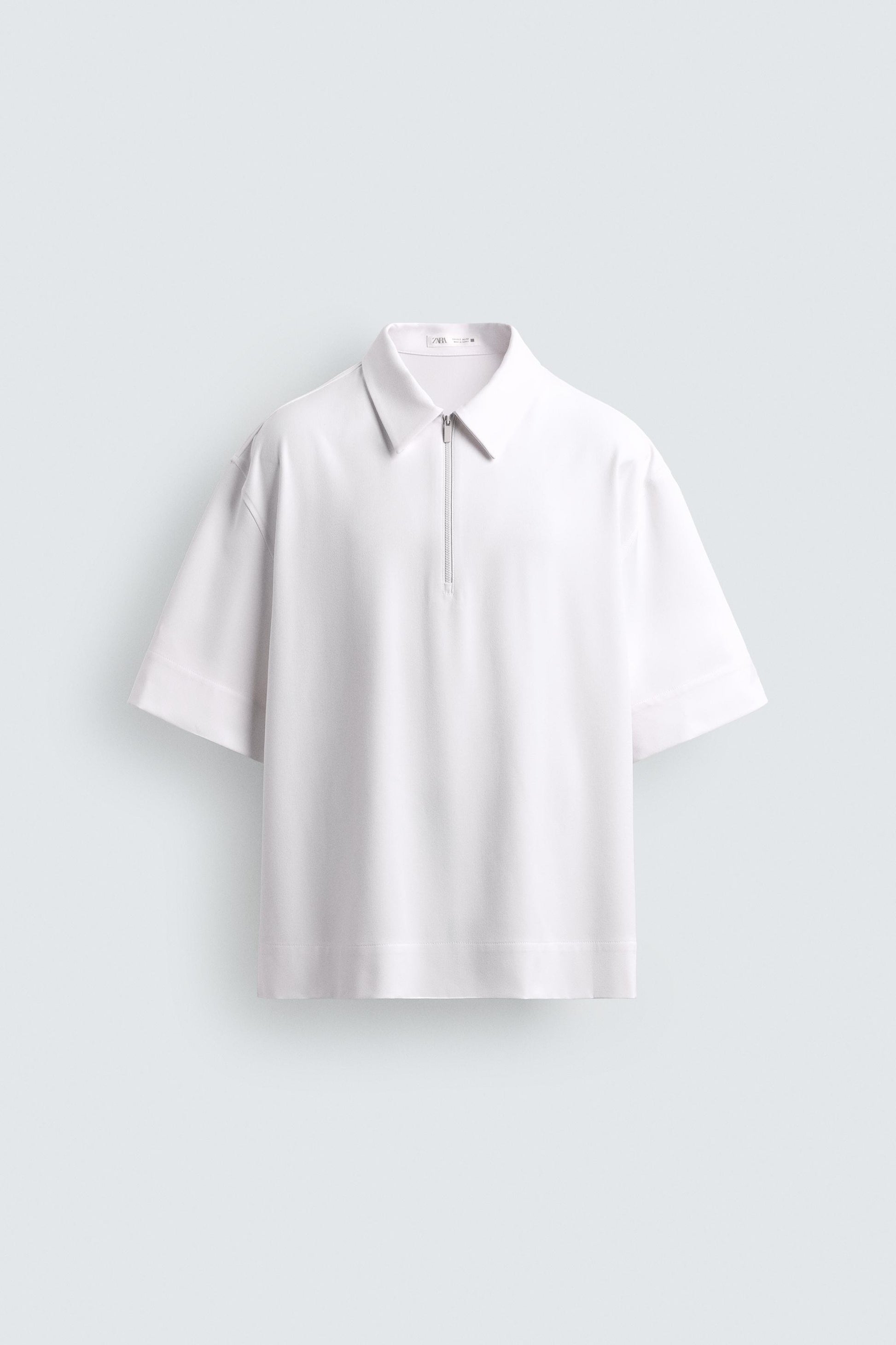 POLO TÉCNICO COM FECHO DE CORRER