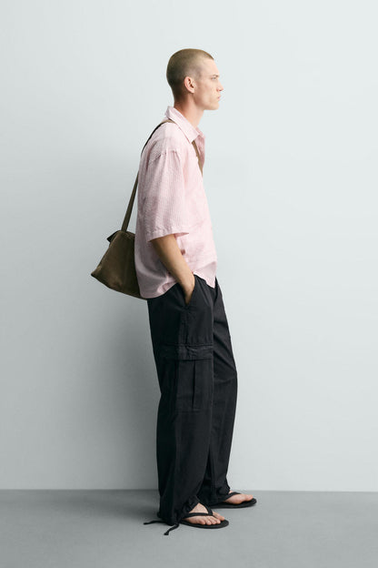 CAMISA JACQUARD COM RELEVO ÀS RISCAS