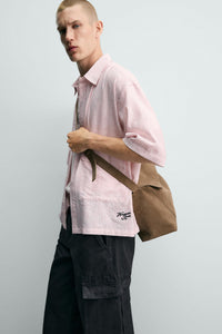CAMISA JACQUARD COM RELEVO ÀS RISCAS
