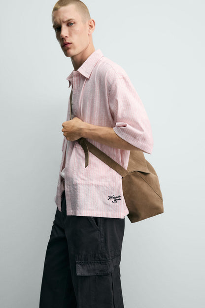 CAMISA JACQUARD COM RELEVO ÀS RISCAS