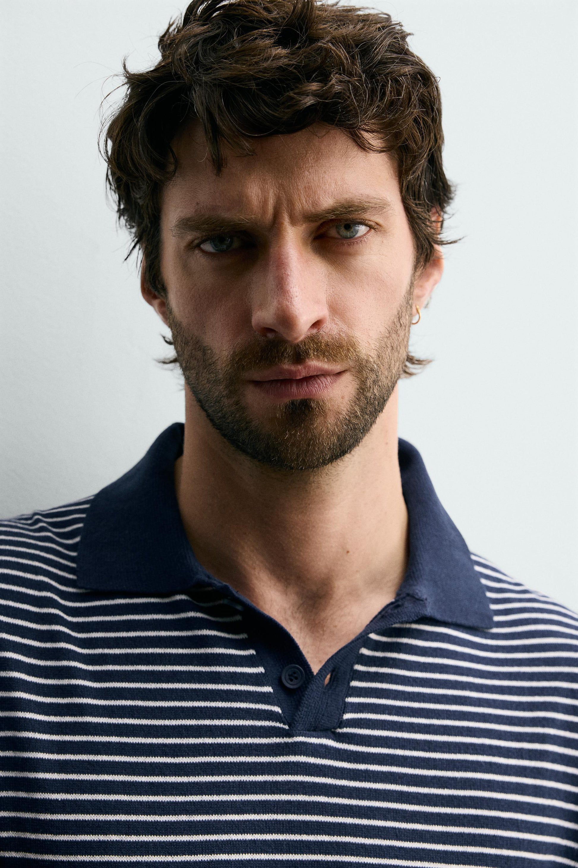 POLO DE MALHA JACQUARD ÀS RISCAS