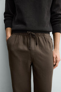 CALÇAS RELAXED FIT COM ESTRUTURA