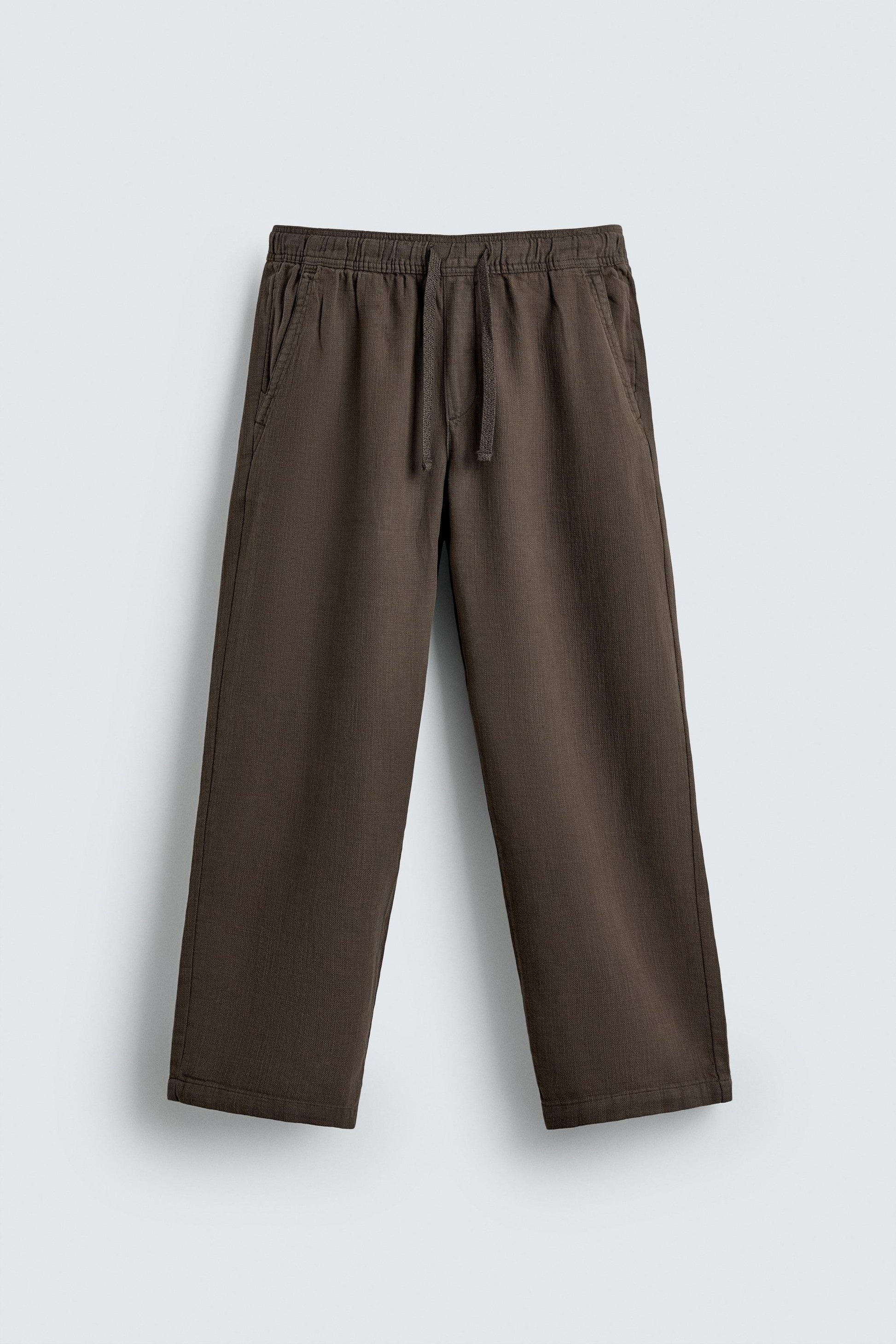 CALÇAS RELAXED FIT COM ESTRUTURA