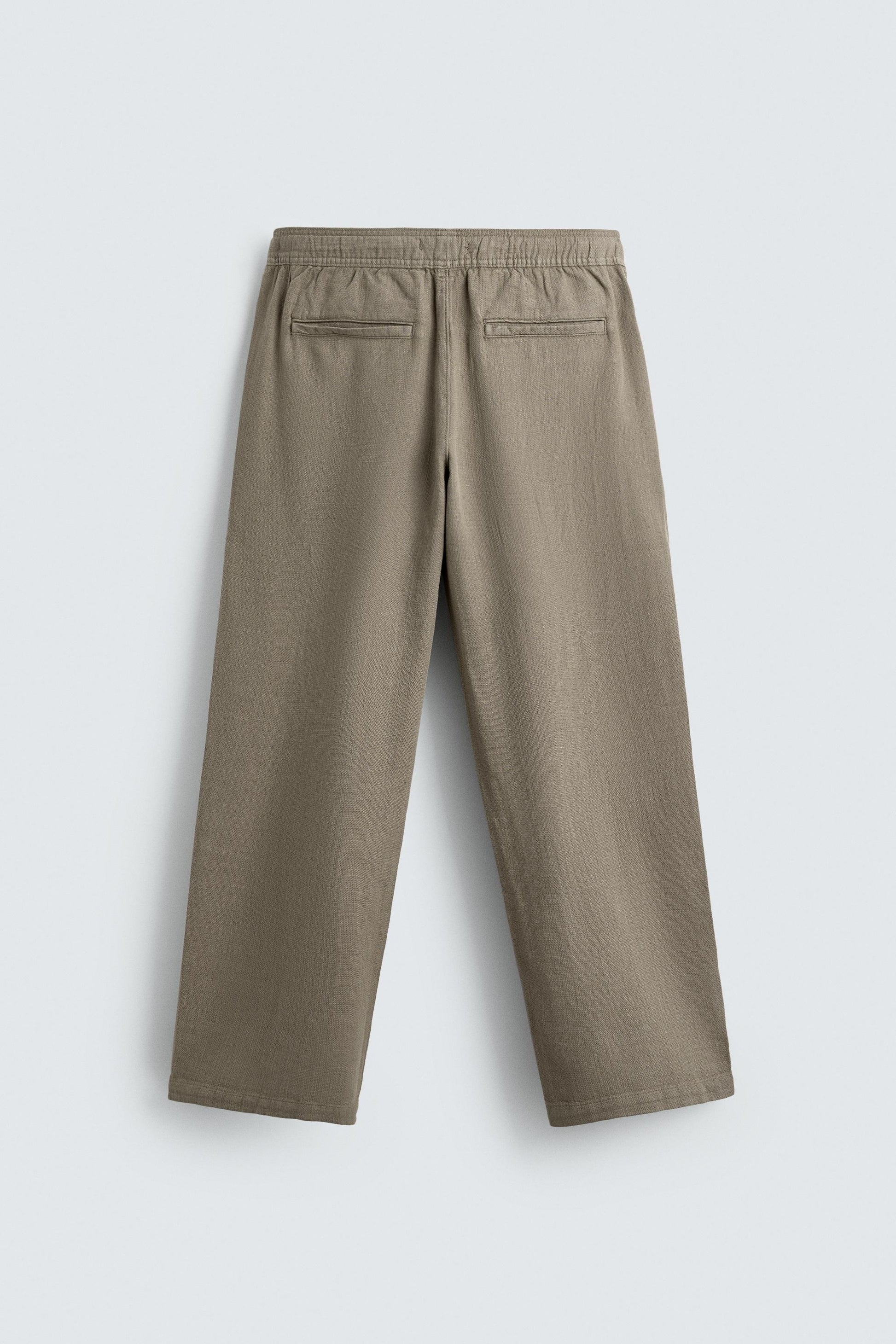 CALÇAS RELAXED FIT COM ESTRUTURA
