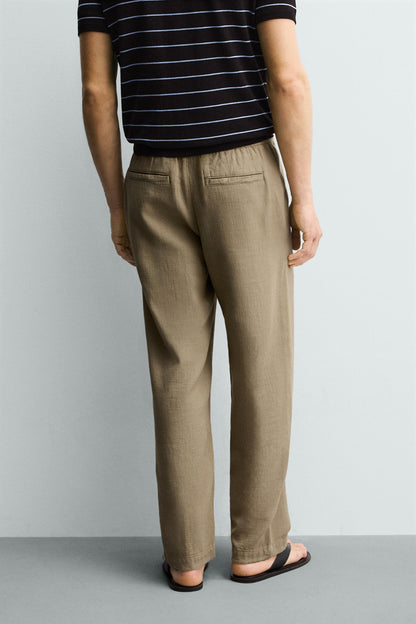 CALÇAS RELAXED FIT COM ESTRUTURA