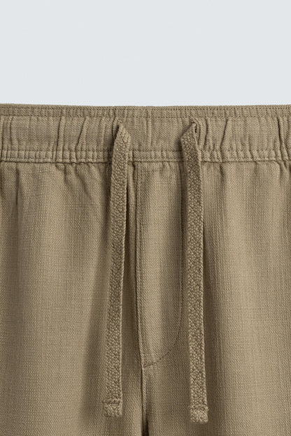 CALÇAS RELAXED FIT COM ESTRUTURA