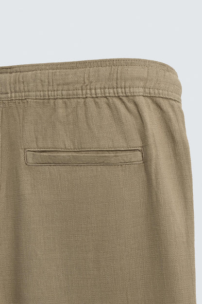 CALÇAS RELAXED FIT COM ESTRUTURA