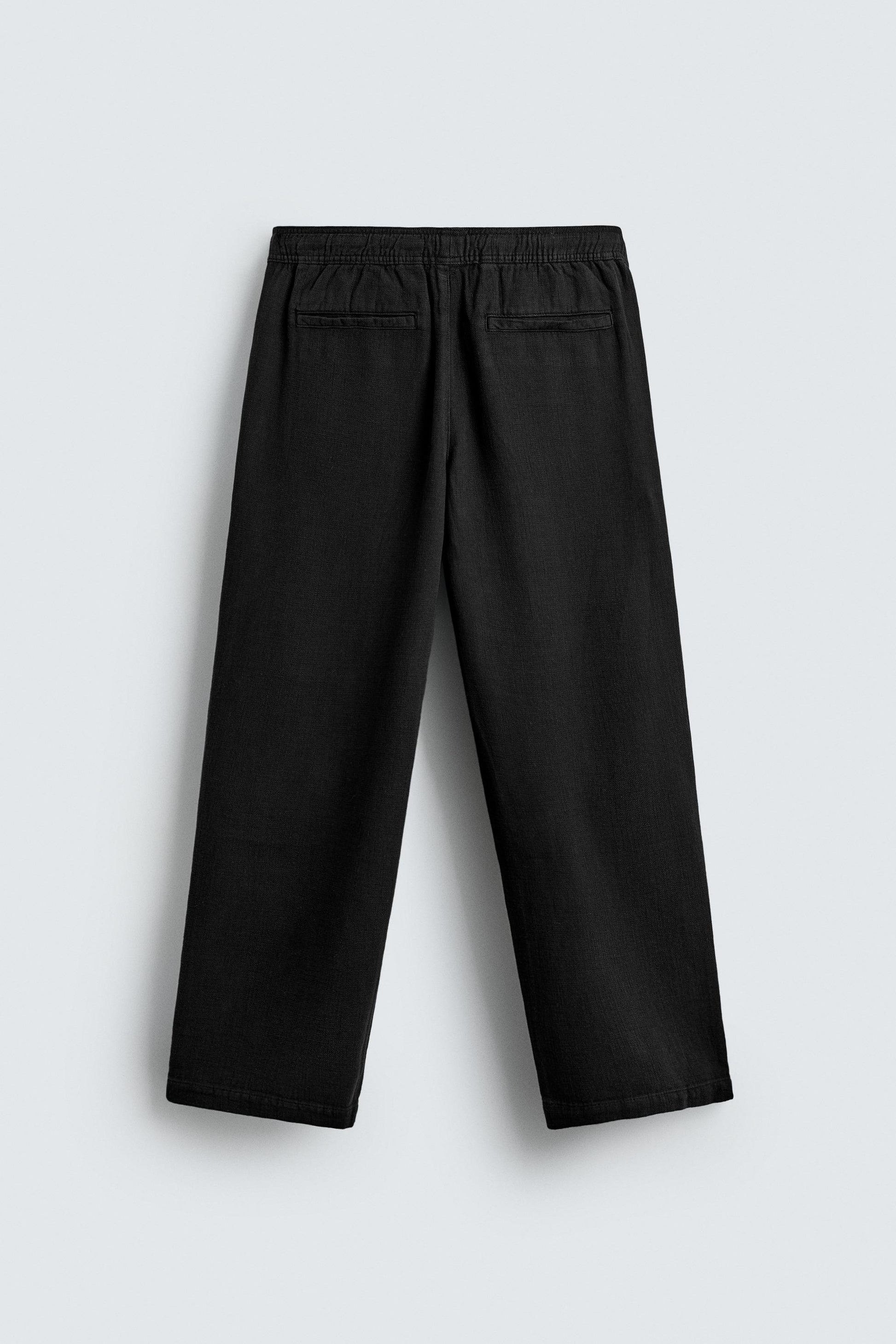 CALÇAS RELAXED FIT COM ESTRUTURA