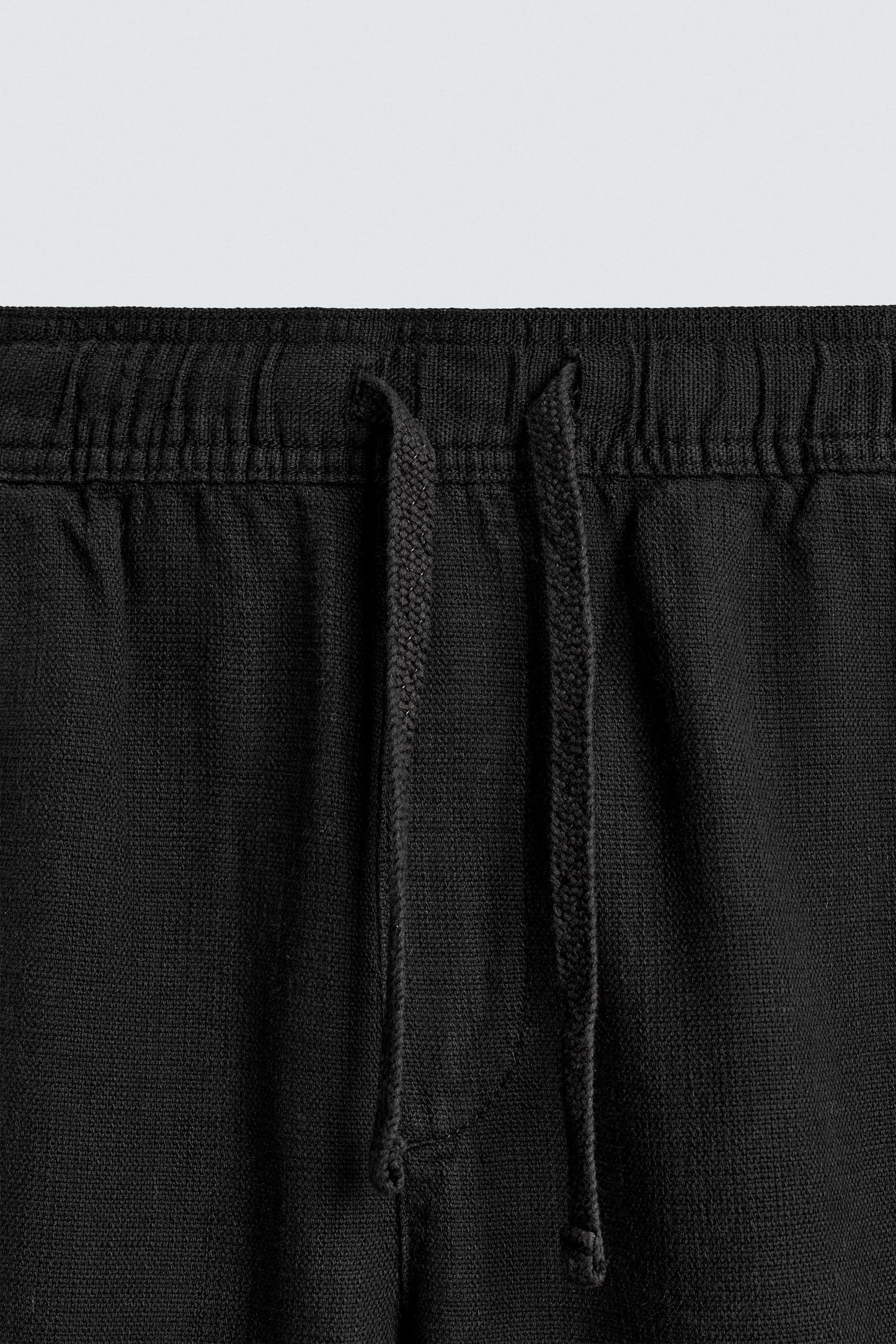 CALÇAS RELAXED FIT COM ESTRUTURA