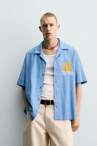 CAMISA RELAXED FIT COM BORDADO SOL