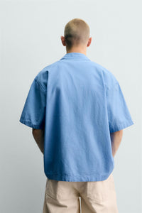 CAMISA RELAXED FIT COM BORDADO SOL