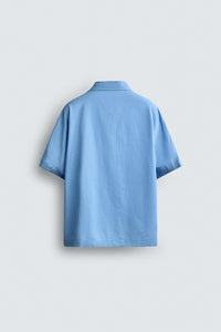 CAMISA RELAXED FIT COM BORDADO SOL