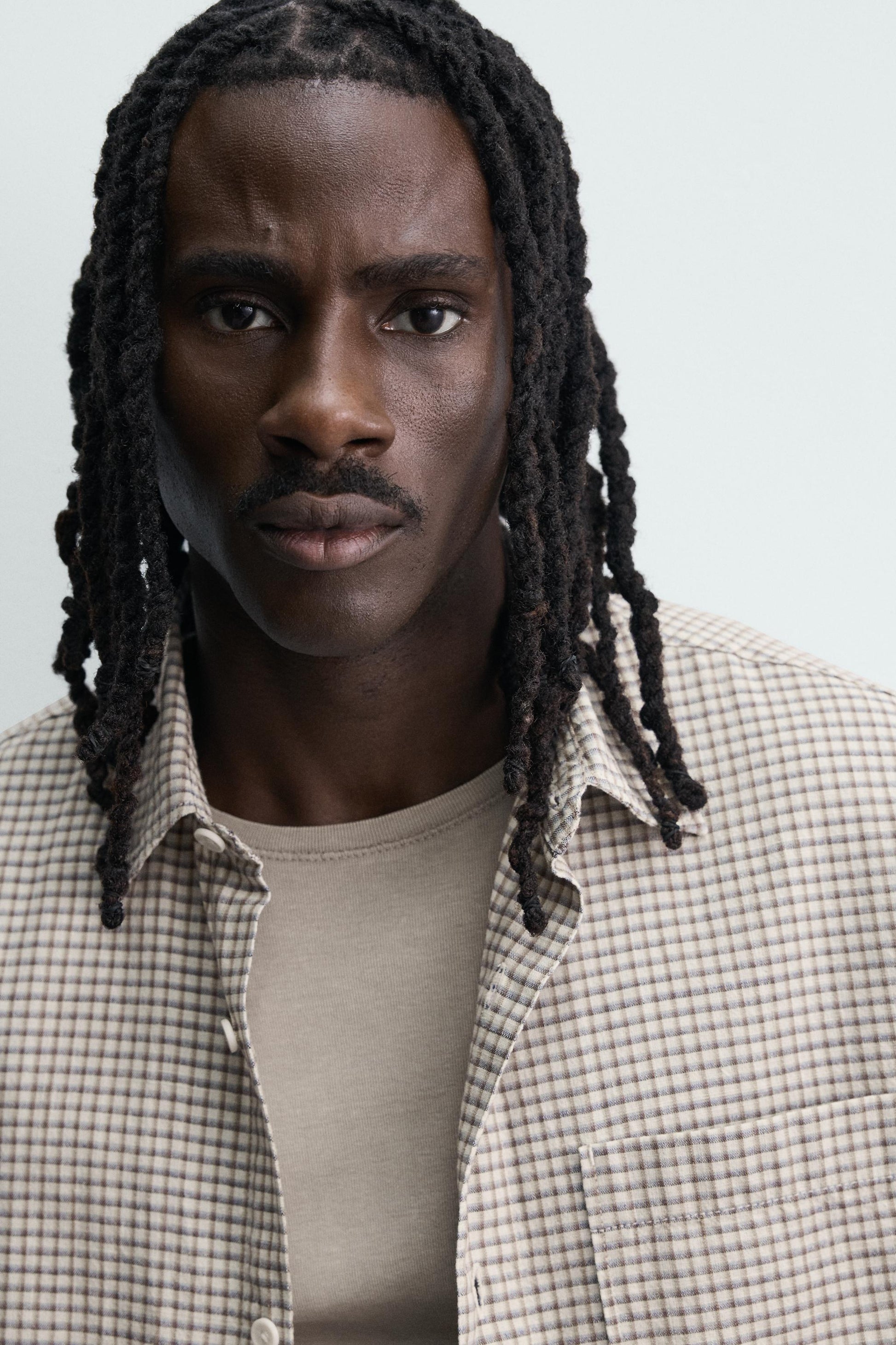 CAMISA RELAXED FIT XADREZ COM TEXTO