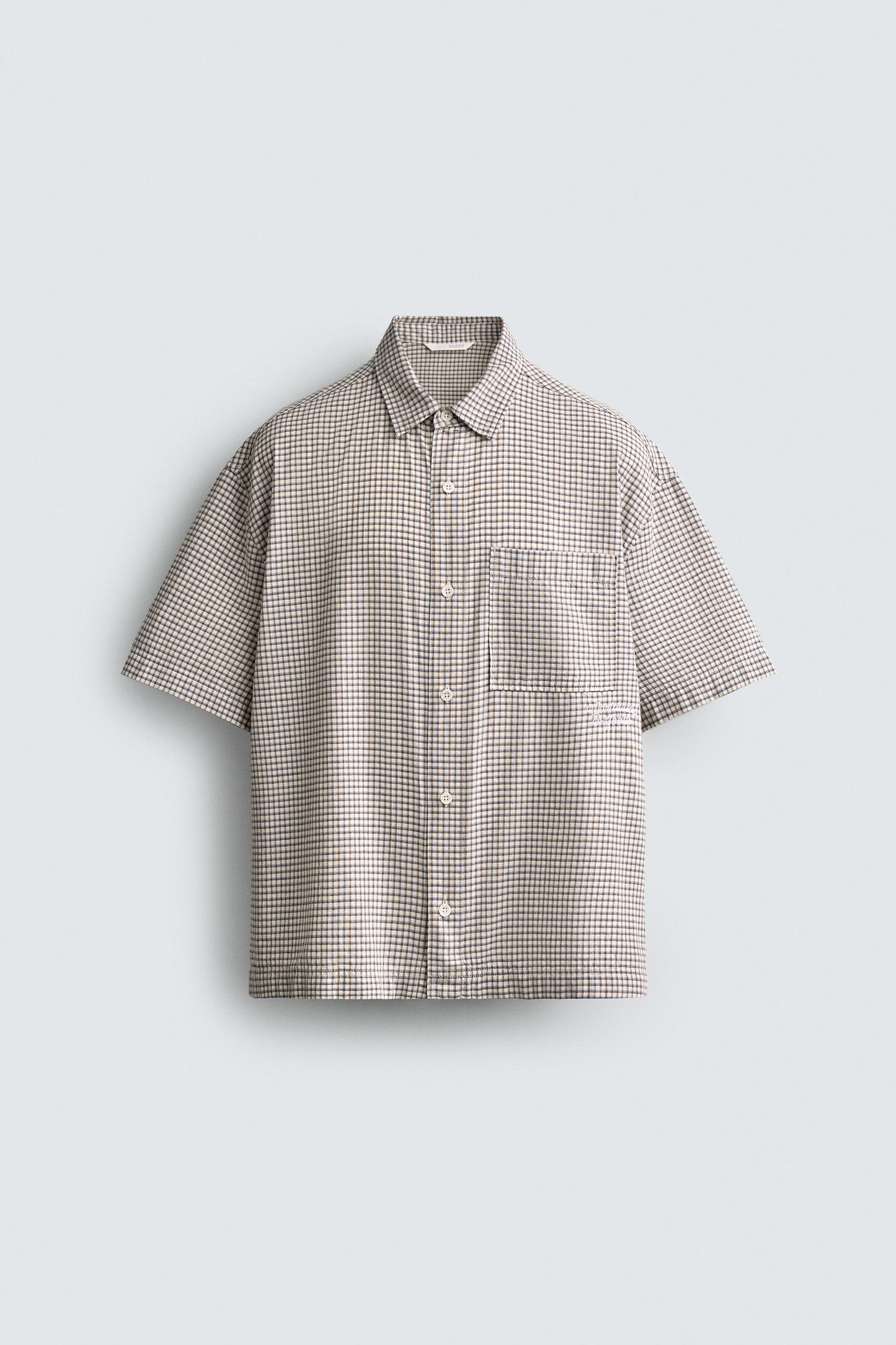 CAMISA RELAXED FIT XADREZ COM TEXTO