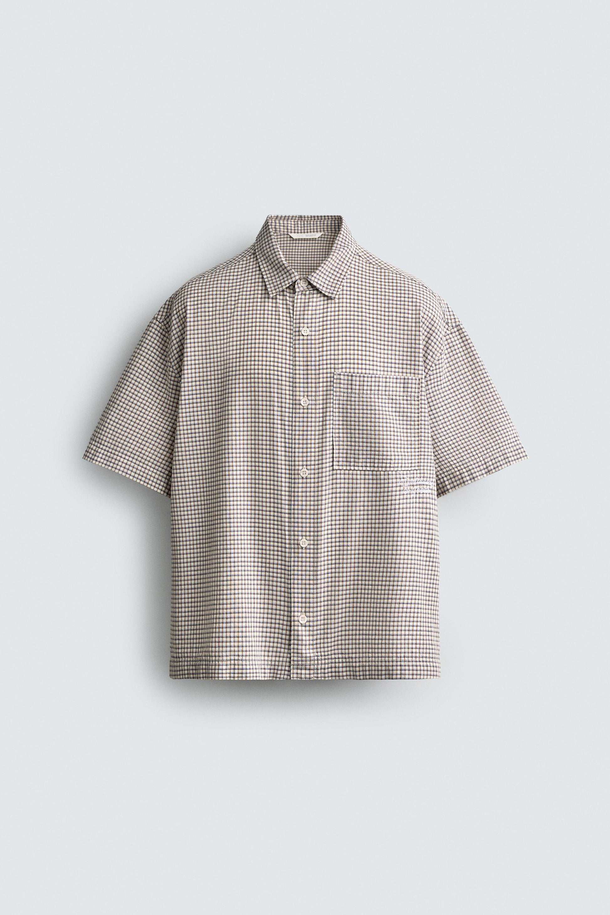 CAMISA RELAXED FIT XADREZ COM TEXTO