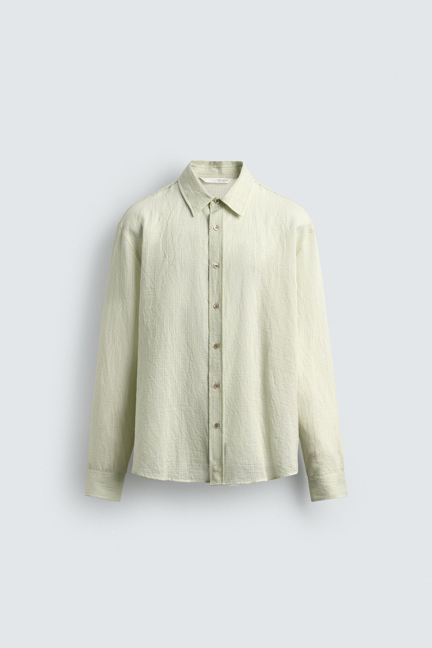 CAMISA FLUIDA DE ESTRUTURA RELAXED FIT