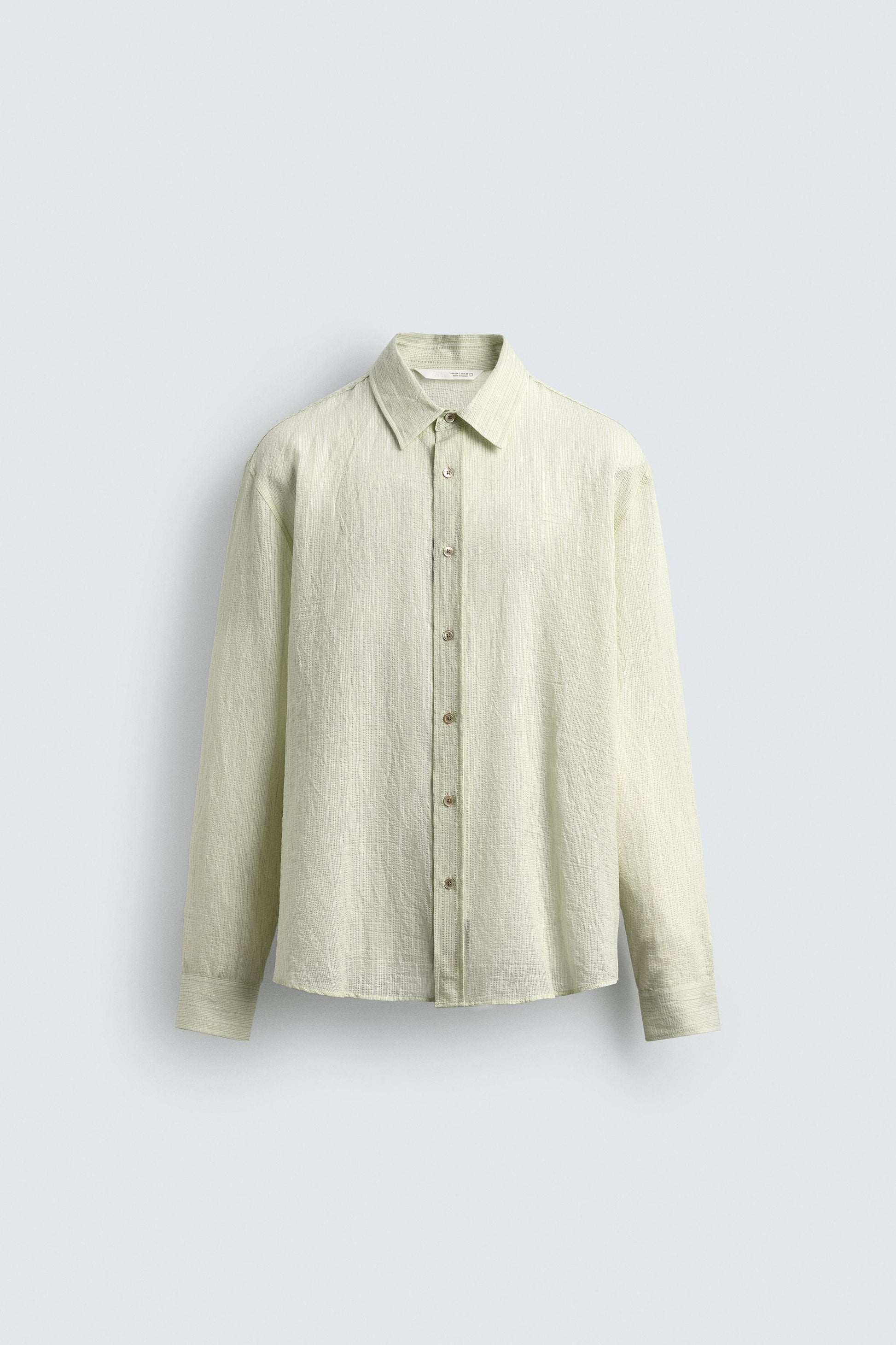 CAMISA FLUIDA DE ESTRUTURA RELAXED FIT