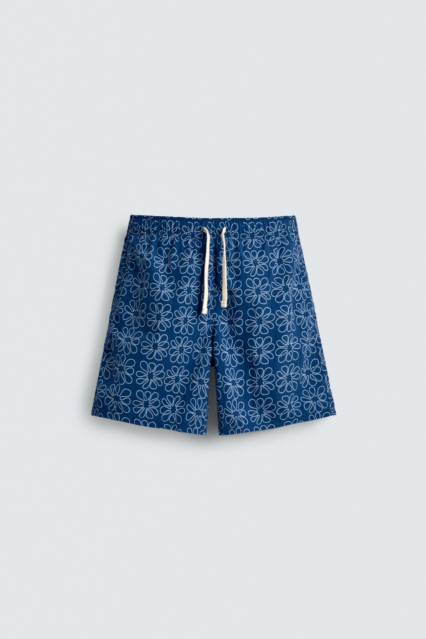 CALÇÕES DE BANHO COMPRIDOS COM ESTAMPADO FLORAL