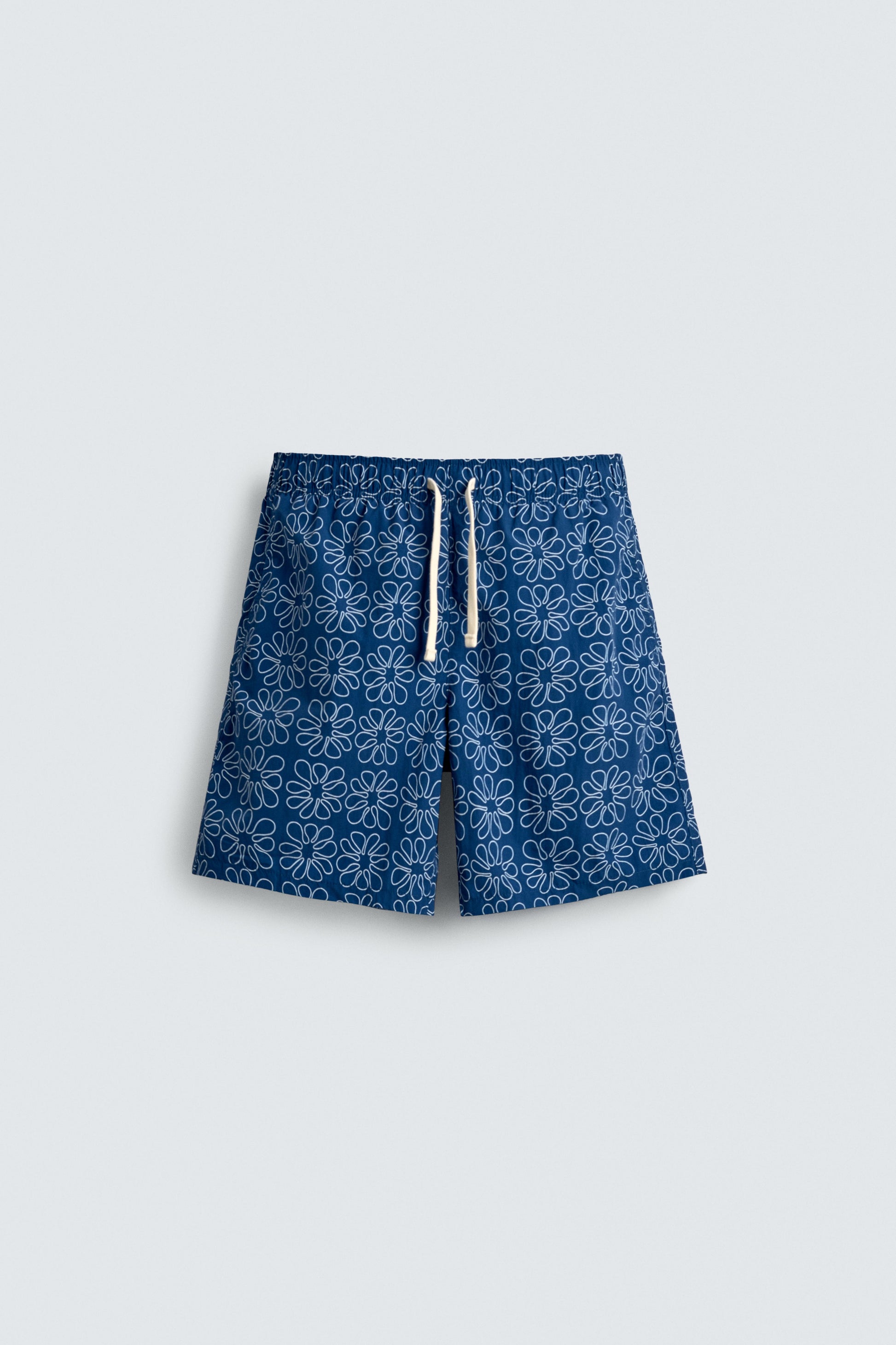 CALÇÕES DE BANHO COMPRIDOS COM ESTAMPADO FLORAL