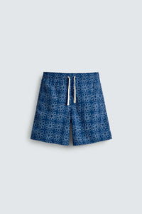 CALÇÕES DE BANHO COMPRIDOS COM ESTAMPADO FLORAL