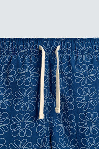 CALÇÕES DE BANHO COMPRIDOS COM ESTAMPADO FLORAL