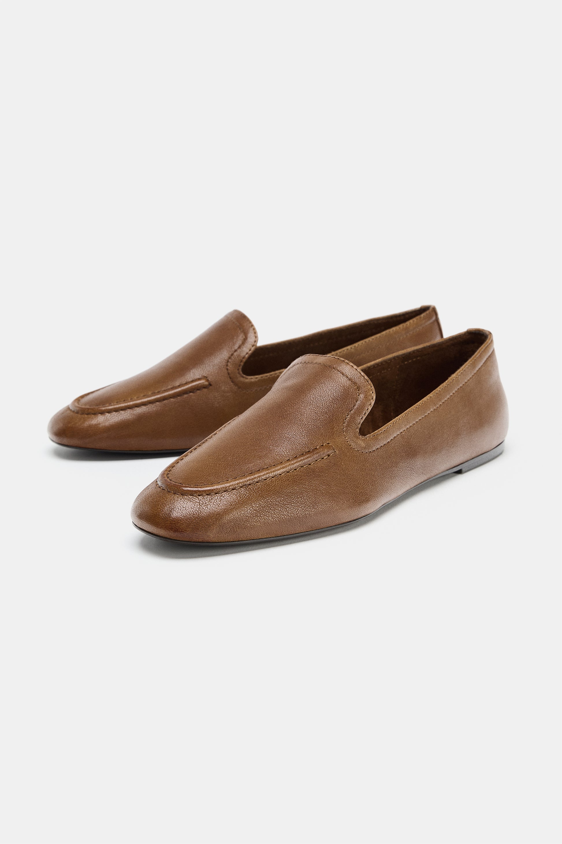MOCASSIM EM PELE COM COPETE SUBIDO - Castanho