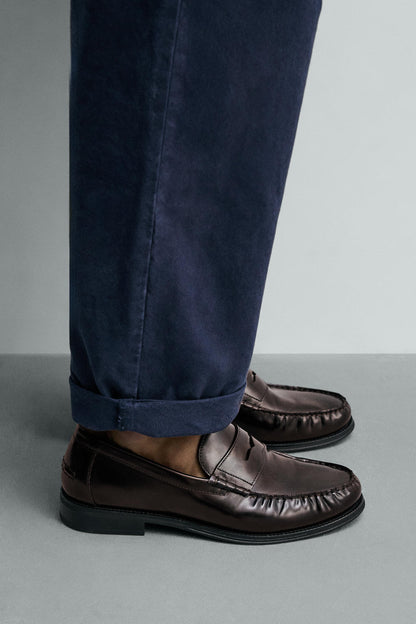 MOCASSIM FRANZIDO EM PELE