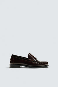 MOCASSIM FRANZIDO EM PELE