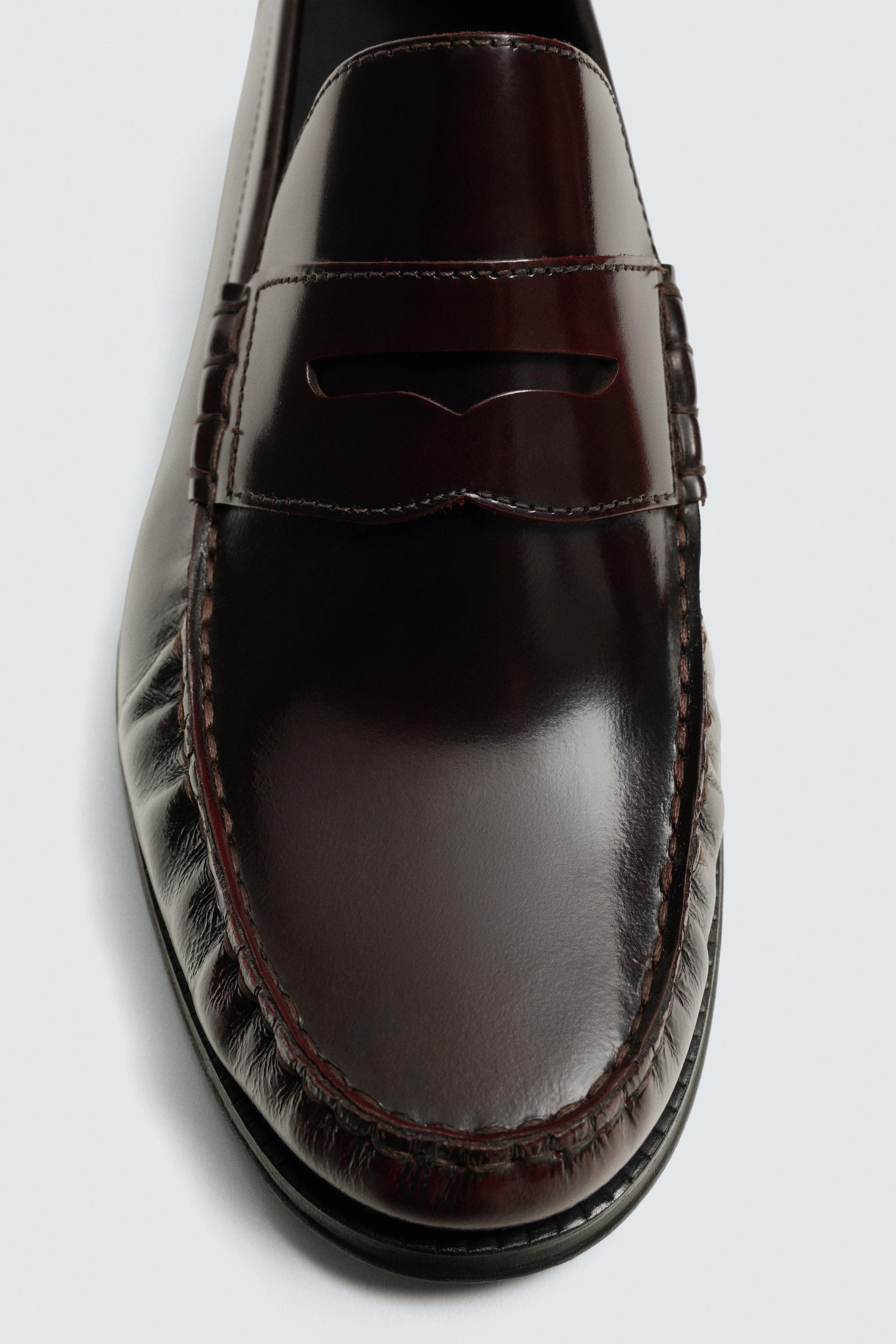 MOCASSIM FRANZIDO EM PELE
