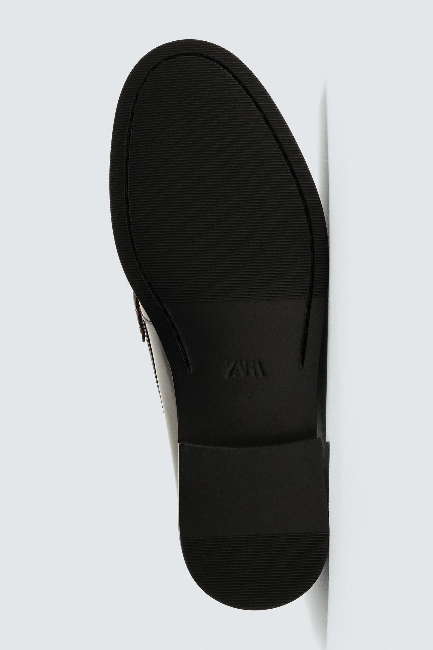 MOCASSIM FRANZIDO EM PELE