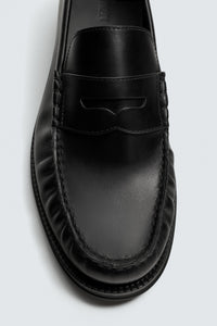 MOCASSIM FRANZIDO EM PELE