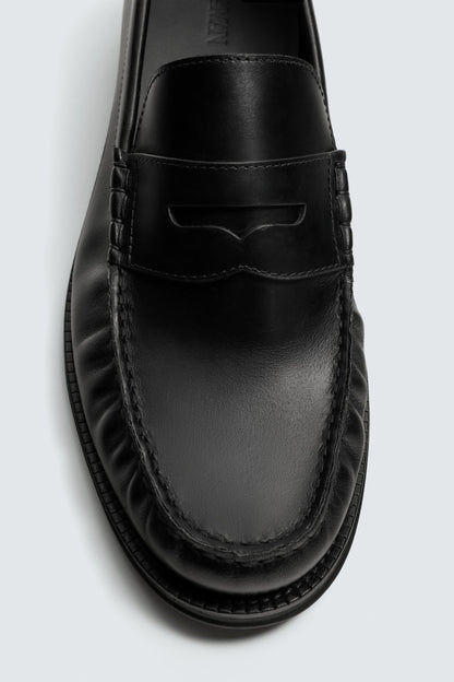 MOCASSIM FRANZIDO EM PELE