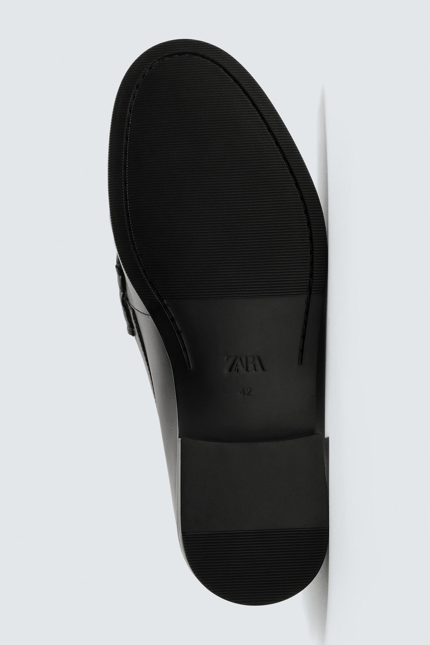 MOCASSIM FRANZIDO EM PELE