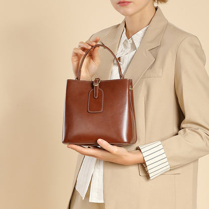 Malas femininas, nova bolsa versátil primavera/verão 2025, mala crossbody de grande capacidade de alta gama, mala de ombro simples em pele genuína
