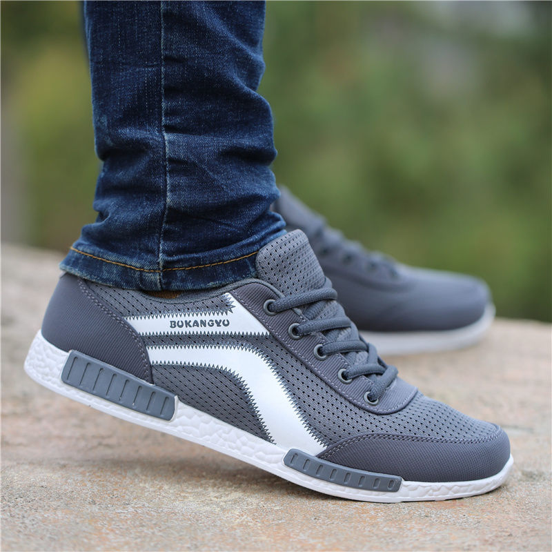 Sapatos de primavera e modernos para homem, sapatos de rede respiráveis, sapatos desportivos casuais ao estilo coreano resistentes a odores, sapatos versáteis de malha oca para homens